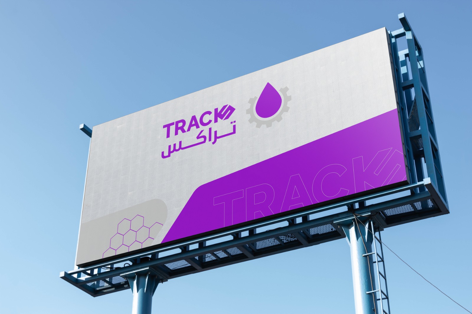 TRACKS purple and silver identity on a billboard